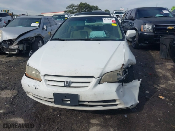 2002 Honda Accord Sdn EX with VIN JHMCG56632C004934, listed as a IAAI auction lot 41595113 with 298,868 mi miles. Bid and sale history available at carsss.com. Image 12.