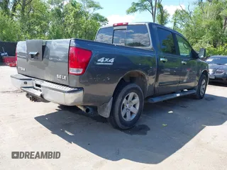 2004 Nissan Titan LE with VIN 1N6AA07B04N525607, listed as a IAAI auction lot 42180184 with 267,589 mi miles. Bid and sale history available at carsss.com. Image 4.