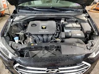 2018 Hyundai Elantra SE z VIN KMHD74LFXJU512214, wystawiony jako Copart lot #50539025 z przebiegiem 76 068 mil mil oraz Szkoda całkowita • Salvage title. Historia ofert i sprzedaży dostępna na DreamBid. Obrazek 11.
