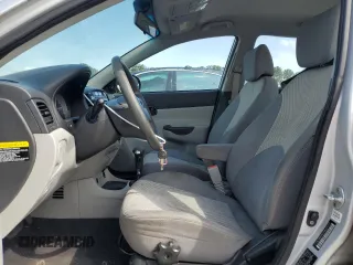2011 Hyundai Accent GLS z VIN KMHCN4AC9BU602370, wystawiony jako Copart lot #58574905 z przebiegiem 184 916 mil mil oraz Szkoda całkowita • Salvage title. Historia ofert i sprzedaży dostępna na DreamBid. Obrazek 7.