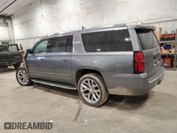 2019 Chevrolet Suburban Premier with VIN 1GNSKJKC7KR323435, listed as a Copart auction lot 43595885 with 79,813 mi miles and Salvage Title. Bid and sale history available at DreamBid. Image 2.