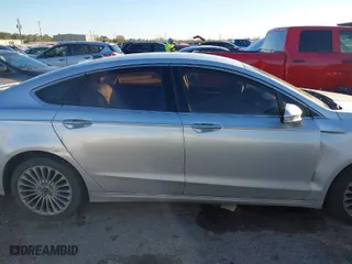 2016 Ford Fusion Titanium with VIN 3FA6P0K95GR369860, listed as a IAAI auction lot 41239380 with 191,396 mi miles. Bid and sale history available at carsss.com. Image 13.