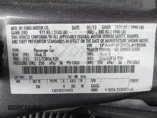 2012 Ford Focus SE with VIN 1FAHP3F21CL415006, listed as a IAAI auction lot 42073643 with 168,516 mi miles. Bid and sale history available at carsss.com. Image 9.