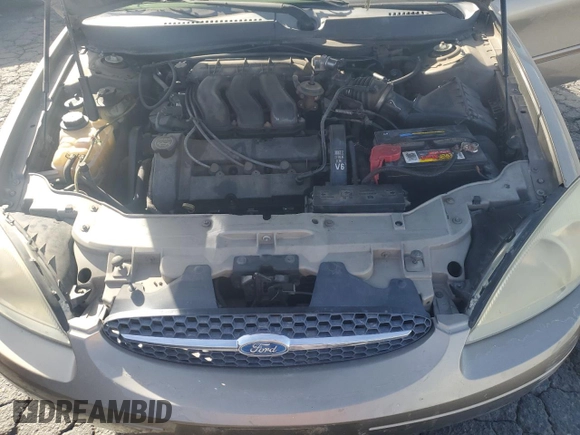 2003 Ford Taurus SEL Deluxe with VIN 1FAFP56S23G221922, listed as a Copart auction lot 79673294 with 142,911 mi miles and Salvage Title. Bid and sale history available at DreamBid. Image 11.