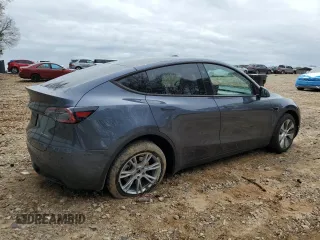 2023 Tesla Model Y Long Range z VIN 7SAYGDEE5PA164270, wystawiony jako Copart lot #50260835 z przebiegiem 17 340 mil mil oraz Szkoda całkowita • Salvage title. Historia ofert i sprzedaży dostępna na DreamBid. Obrazek 3.