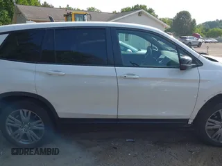 2019 Honda Passport EX-L with VIN 5FNYF8H56KB029748, listed as a IAAI auction lot 42405028 with 59,009 mi miles and . Bid and sale history available at DreamBid. Image 14.