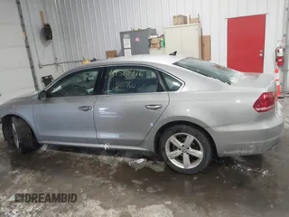 2013 Volkswagen Passat SE w/Sunroof & Nav with VIN 1VWBP7A30DC150018, listed as a IAAI auction lot 41580416 with 75,231 mi miles. Bid and sale history available at carsss.com. Image 15.