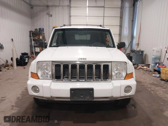 2010 Jeep Commander Sport z VIN 1J4RG4GK7AC132121, wystawiony jako IAAI lot #41187854 z przebiegiem 155 413 mil mil oraz . Historia ofert i sprzedaży dostępna na DreamBid. Obrazek 13.