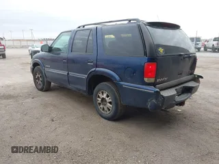 2000 GMC Jimmy SLE Convenience with VIN 1GKDT13W8Y2340743, listed as a IAAI auction lot 41393906 with 196,520 mi miles. Bid and sale history available at carsss.com. Image 3.