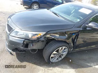 2015 Kia Optima SX Turbo with VIN 5XXGR4A67FG407786, listed as a IAAI auction lot 41606324 with 194,837 mi miles. Bid and sale history available at carsss.com. Image 6.