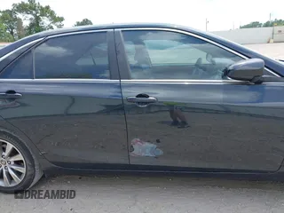 2015 Toyota Camry XLE with VIN 4T1BF1FKXFU881017, listed as a IAAI auction lot 42054825 with 122,232 mi miles and . Bid and sale history available at DreamBid. Image 14.