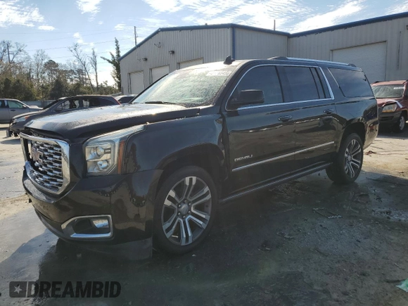 2019 GMC Yukon XL Denali with VIN 1GKS2HKJ9KR264134, listed as a Copart auction lot 43138545 with 105,690 mi miles and Salvage Title. Bid and sale history available at DreamBid. Image 1.