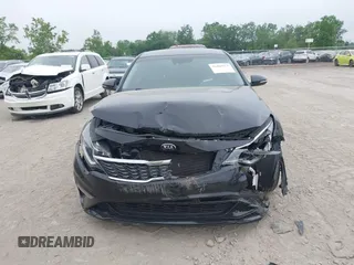 2020 Kia Optima LX with VIN 5XXGT4L37LG445597, listed as a IAAI auction lot 42404651 with 56,851 mi miles and . Bid and sale history available at DreamBid. Image 12.