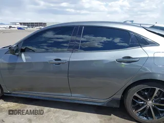 2021 Honda Civic Sport with VIN SHHFK7H48MU412242, listed as a IAAI auction lot 41967318 with 54,137 mi miles and . Bid and sale history available at DreamBid. Image 14.