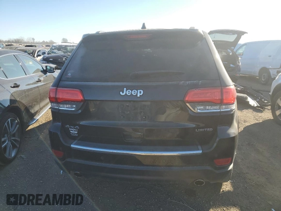 2014 Jeep Grand Cherokee Limited with VIN 1C4RJFBG1EC568426, listed as a Copart auction lot 87039694 with 126,577 mi miles and Salvage title. Bid and sale history available at DreamBid. Image 6.
