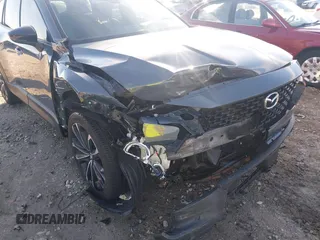 2023 Mazda CX-50 S Premium Plus with VIN 7MMVABEM2PN102083, listed as a IAAI auction lot 41589242 with 75,373 mi miles and . Bid and sale history available at DreamBid. Image 6.