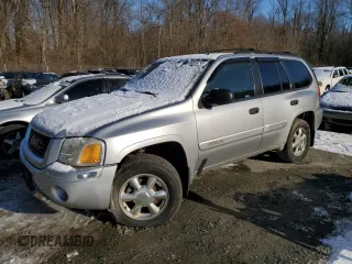 2005 GMC Envoy SLE with VIN 1GKDT13S952144044, listed as a Copart auction lot 88269485 with 0 mi miles and Salvage Title. Bid and sale history available at carsss.com. Image 1.