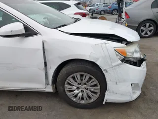 2014 Toyota Camry L with VIN 4T4BF1FK1ER416128, listed as a IAAI auction lot 42030370 with 79,475 mi miles and . Bid and sale history available at DreamBid. Image 17.