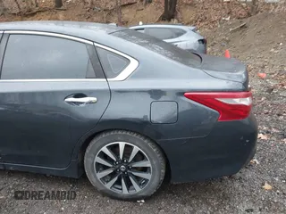 2018 Nissan Altima SV with VIN 1N4AL3AP3JC205875, listed as a IAAI auction lot 41892855 with 159,630 mi miles and . Bid and sale history available at DreamBid. Image 12.