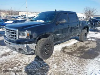2013 GMC Sierra 1500 SLT with VIN 3GTP2WE79DG377543, listed as a IAAI auction lot 41407899 with 101,827 mi miles. Bid and sale history available at carsss.com. Image 2.