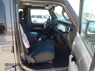 2018 Jeep Wrangler Unlimited Sahara with VIN 1C4HJXEN1JW236779, listed as a IAAI auction lot 42238158 with 72,879 mi miles and . Bid and sale history available at DreamBid. Image 5.