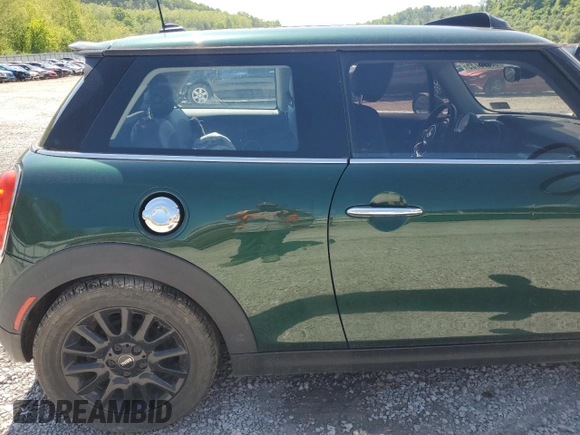 2014 MINI Hardtop S with VIN WMWXM7C50ET970033, listed as a Copart auction lot 56160735 with 125,208 mi miles and Salvage title. Bid and sale history available at DreamBid. Image 10.