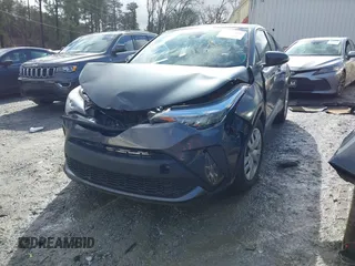 2021 Toyota C-HR LE with VIN NMTKHMBX9MR128998, listed as a IAAI auction lot 41575235 with 96,908 mi miles. Bid and sale history available at carsss.com. Image 17.