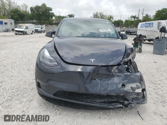 2024 Tesla Model Y Long Range с VIN 7SAYGDEE7RA279293, выставлен на аукционе Copart как лот 62758065 с пробегом 23 271 миль миль и Списание • Salvage title. История ставок и продаж доступна на DreamBid. Изображение 5.