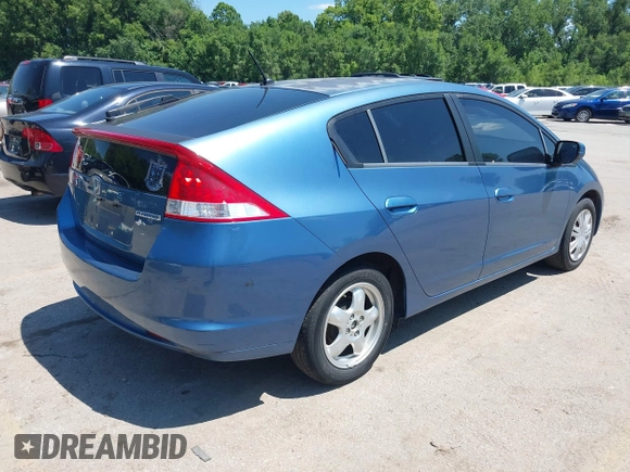 2010 Honda Insight LX with VIN JHMZE2H56AS013649, listed as a IAAI auction lot 42646690 with 5,593 mi miles and . Bid and sale history available at DreamBid. Image 4.