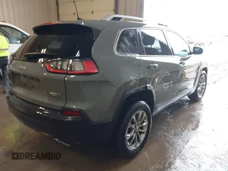 2021 Jeep Cherokee Latitude Lux with VIN 1C4PJMMX0MD214608, listed as a IAAI auction lot 41452997 with 31,441 mi miles and . Bid and sale history available at DreamBid. Image 4.