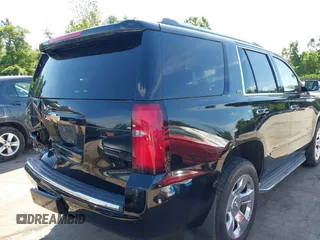 2015 Chevrolet Tahoe LTZ z VIN 1GNSKCKC3FR104845, wystawiony jako IAAI lot #42291785 z przebiegiem 75 047 mil mil oraz . Historia ofert i sprzedaży dostępna na DreamBid. Obrazek 18.