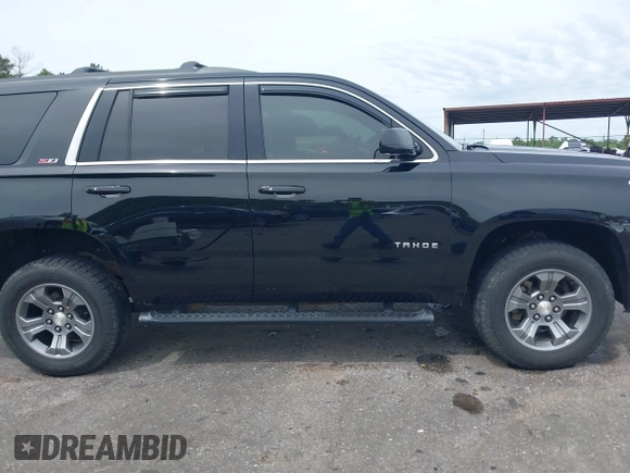 2017 Chevrolet Tahoe LT z VIN 1GNSKBKC8HR311969, wystawiony jako IAAI lot #42126414 z przebiegiem 160 994 mil mil oraz . Historia ofert i sprzedaży dostępna na DreamBid. Obrazek 13.