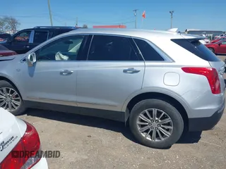 2017 Cadillac XT5 Luxury FWD z VIN 1GYKNBRS6HZ231609, wystawiony jako IAAI lot #42043791 z przebiegiem 106 594 mil mil oraz . Historia ofert i sprzedaży dostępna na DreamBid. Obrazek 14.