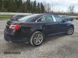 2014 Ford Taurus Limited z VIN 1FAHP2F85EG151167, wystawiony jako Copart lot #54376275 z przebiegiem 136 612 mil mil oraz Szkody całkowita. Historia ofert i sprzedaży dostępna na DreamBid. Obrazek 3.