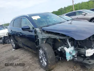 2021 Mazda CX-9 Carbon Edition with VIN JM3TCADY1M0516505, listed as a IAAI auction lot 42016644 with 50,900 mi miles and . Bid and sale history available at carsss.com. Image 14.