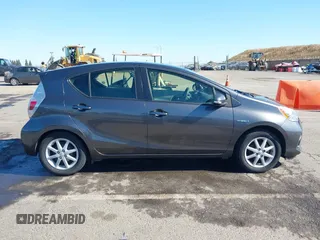 2014 Toyota Prius One z VIN JTDKDTB39E1078879, wystawiony jako IAAI lot #42201010 z przebiegiem 147 544 mil mil oraz . Historia ofert i sprzedaży dostępna na DreamBid. Obrazek 13.