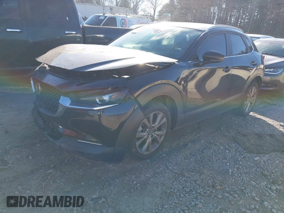 2023 Mazda CX-30 2.5 S Preferred Package with VIN 3MVDMBCM9PM519070, listed as a IAAI auction lot 41351129 with 76,711 mi miles. Bid and sale history available at carsss.com. Image 17.