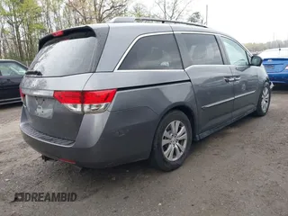 2014 Honda Odyssey EX-L with VIN 5FNRL5H63EB033684, listed as a IAAI auction lot 42025249 with 128,017 mi miles and . Bid and sale history available at carsss.com. Image 4.