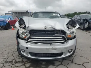 2012 MINI Countryman with VIN WMWZB3C5XCWM06778, listed as a Copart auction lot 61201285 with 64,676 mi miles and Salvage title. Bid and sale history available at DreamBid. Image 5.