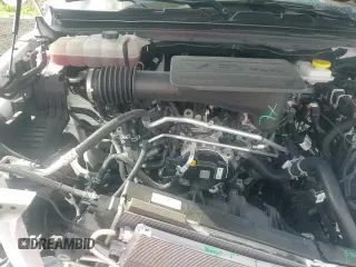 2025 Ram 1500 Big Horn z VIN 1C6RREFG9SN668925, wystawiony jako Copart lot #84624335 z przebiegiem 9 188 mil mil oraz Szkoda całkowita • Salvage title. Historia ofert i sprzedaży dostępna na DreamBid. Obrazek 14.