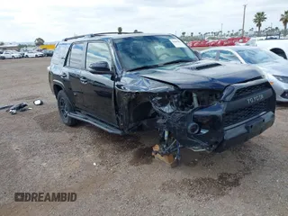 2018 Toyota 4Runner SR5 with VIN JTEBU5JR8J5588785, listed as a IAAI auction lot 41880466 with 57,128 mi miles. Bid and sale history available at carsss.com. Image 1.