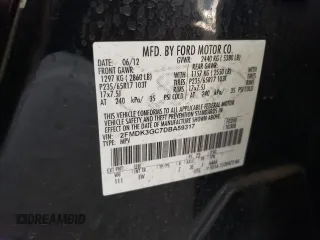 2013 Ford Edge SE with VIN 2FMDK3GC7DBA59317, listed as a Copart auction lot 62963015 with 146,816 mi miles and Salvage title. Bid and sale history available at DreamBid. Image 14.