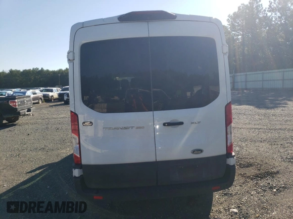 2021 Ford Transit Passenger XL with VIN 1FBAX2C84MKA04547, listed as a Copart auction lot 72682074 with 87,077 mi miles and Salvage Title. Bid and sale history available at DreamBid. Image 6.