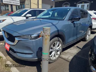 2021 Mazda CX-5 Touring with VIN JM3KFBCM9M0111998, listed as a Copart auction lot 54720195 with 54,398 mi miles and Clean Title. Bid and sale history available at carsss.com. Image 2.