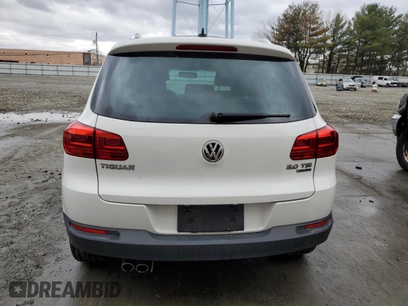 2012 Volkswagen Tiguan S with VIN WVGBV7AX5CW559037, listed as a Copart auction lot 51073435 with 56,620 mi miles and Salvage Title. Bid and sale history available at DreamBid. Image 6.