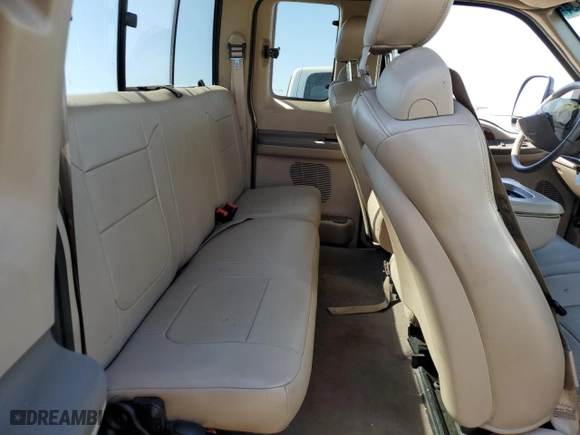 2002 Ford Super Duty F-250 XL with VIN 1FTNX20F12EA19230, listed as a Copart auction lot 74044634 with 392,488 mi miles and Salvage Title. Bid and sale history available at carsss.com. Image 10.