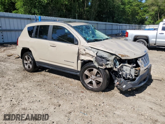 2017 Jeep Compass Latitude with VIN 1C4NJDEB9HD127855, listed as a Copart auction lot 56699735 with 119,046 mi miles and Salvage title. Bid and sale history available at DreamBid. Image 4.