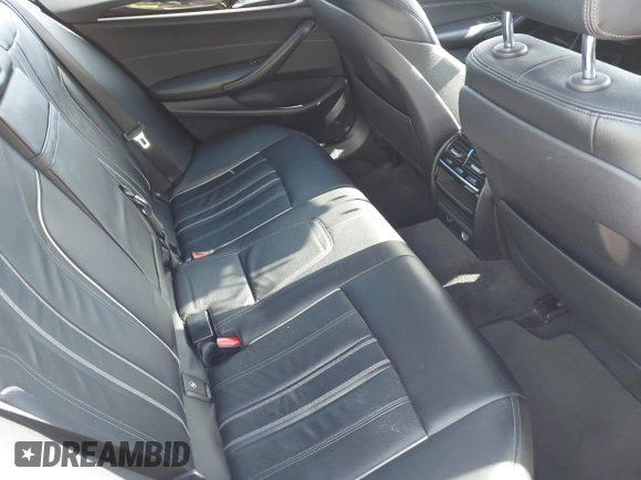 2018 BMW 5 Series 540i xDrive with VIN WBAJE7C58JWD52604, listed as a IAAI auction lot 42264240 with 107,454 mi miles and . Bid and sale history available at DreamBid. Image 8.