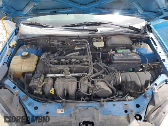 2007 Ford Focus S with VIN 1FAFP34N67W101523, listed as a Copart auction lot 56521835 with 239,505 mi miles and Salvage title. Bid and sale history available at DreamBid. Image 11.