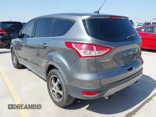 2014 Ford Escape SE with VIN 1FMCU0GX8EUD57801, listed as a IAAI auction lot 41856252 with 136,980 mi miles. Bid and sale history available at carsss.com. Image 3.